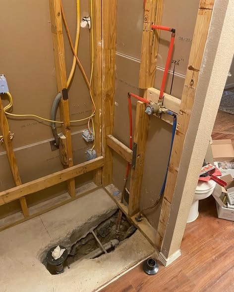 PEX and copper pipe rough-in during bathroom remodel by Haltex Plumbing