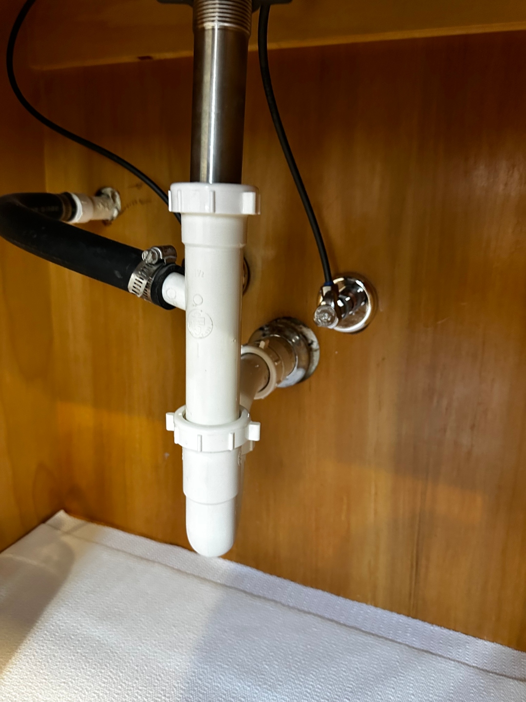 Under-sink drain and supply line installation by Haltex Plumbing
